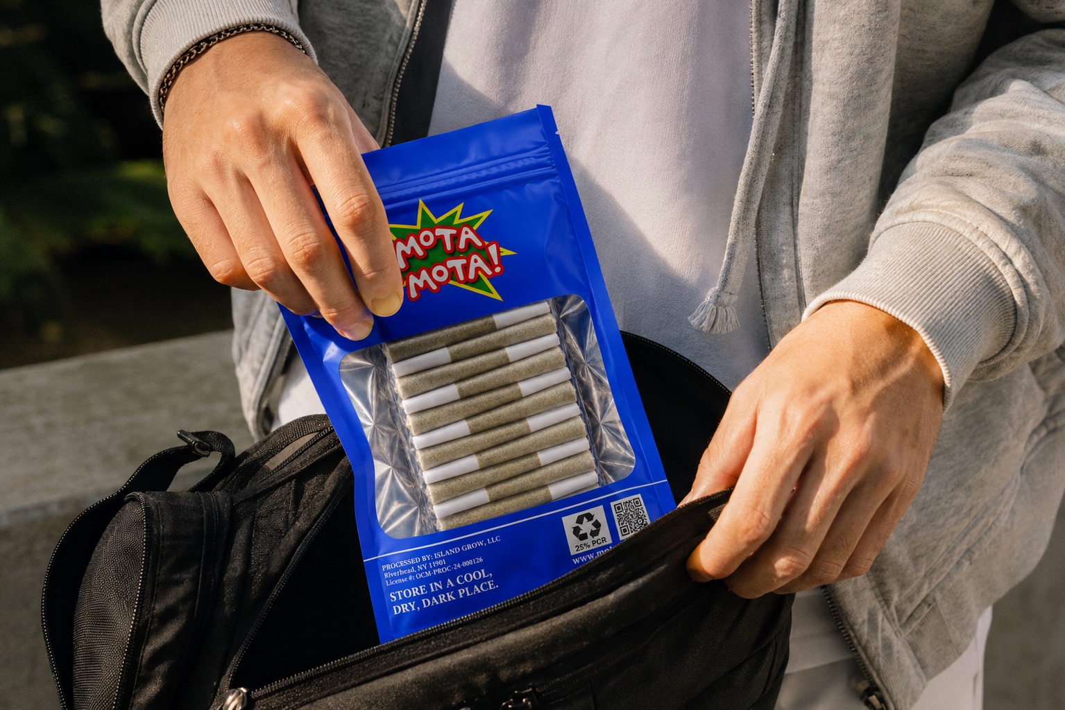 Packing a Mota Mota 40-pack into a backpack before heading out