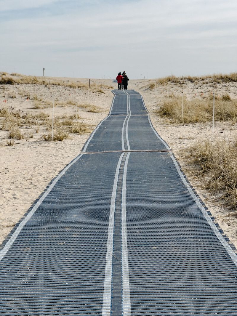 A walkway crossing the dunes toward the beach