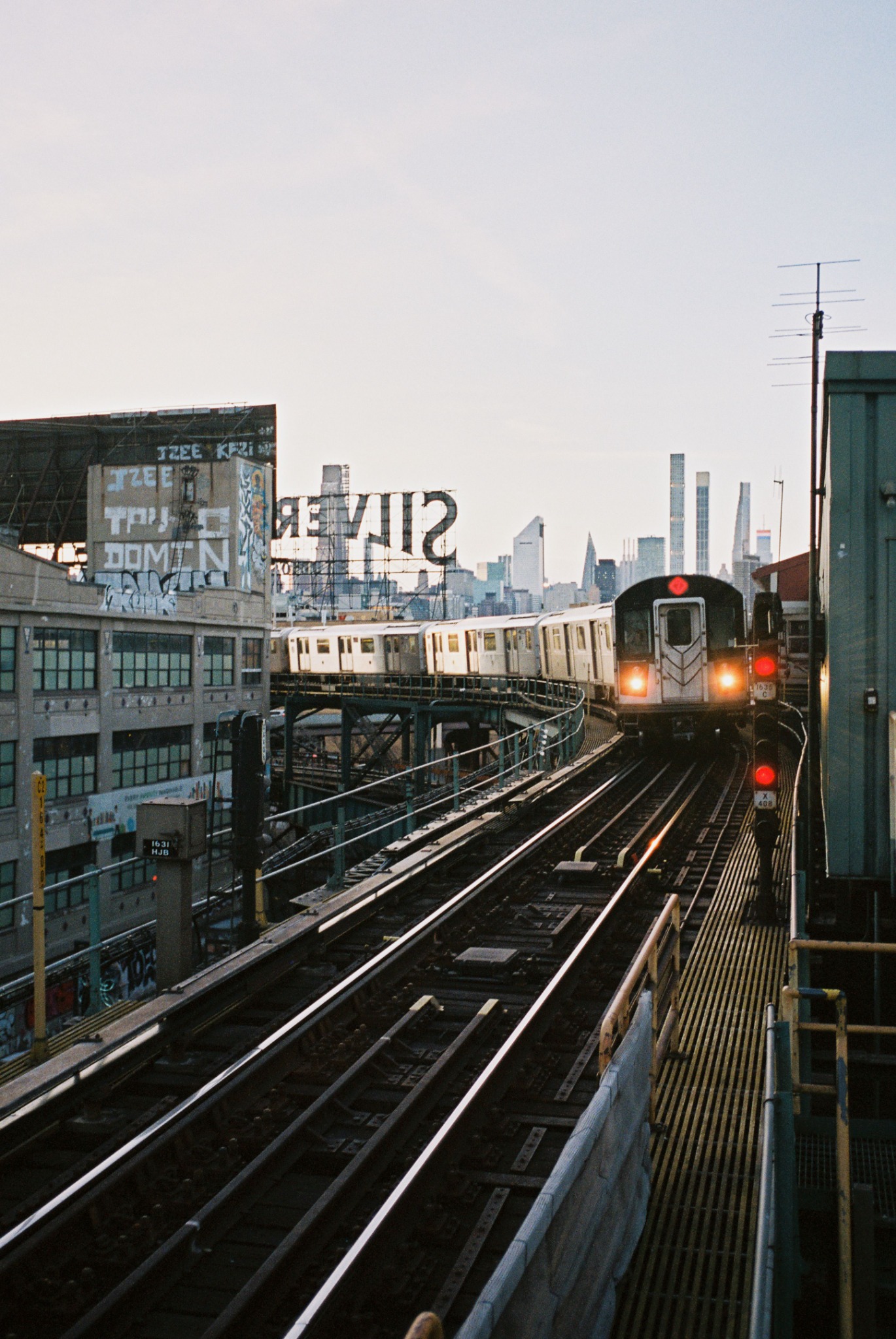 City train moving through the New York urban landscape